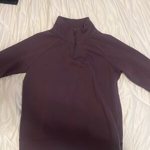 dark purple under Armour heat gear quarter zip size small